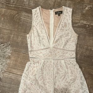 Like New Lulus Sz Xs lace jumpsuit with nude lining.